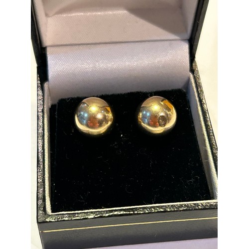 87 - A pair of 9ct gold ball (half sphere) earrings - 0.8 grams