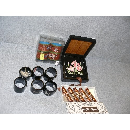 113 - 4 BOXED SETS OF DECORATIVE CHINESE NAPKIN RINGS, COASTERS AND KNIFE RESTS