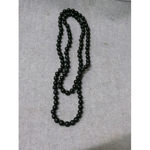 19 - A SET OF BLACK BUDDHIST MONKS BEADED NECKLACE