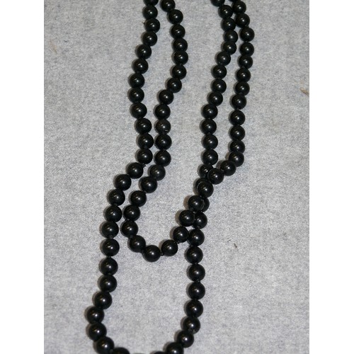 19 - A SET OF BLACK BUDDHIST MONKS BEADED NECKLACE