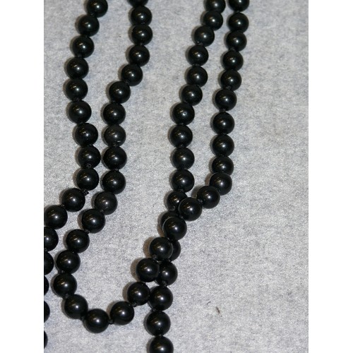 19 - A SET OF BLACK BUDDHIST MONKS BEADED NECKLACE