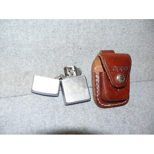 47 - A VINTAGE EARLY ZIPPO  No1 04 JAN 2004 LIGHTER IN LEATHER CASE