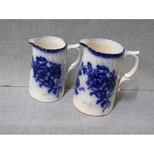 1 - PAIR OF VICTORIAN EARTHENWARE GRADUATED JUGS IN FLOW BLUE MARKED CLIFTON ENGLAND