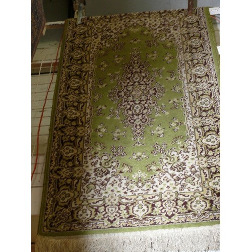 395 - A PATTERNED  OLIVE GREEN RUG