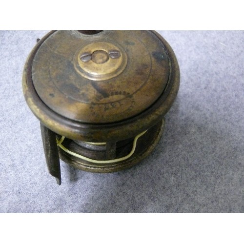 52 - A Carter & Sons of London 2 1/4inch Brass Faced Ebonite Trout Fly Reel, numbered 137, with horn Hand... 