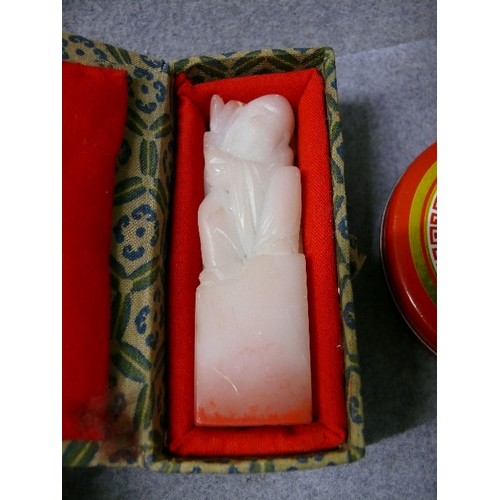 7 - A WHITE JADE HAND CARVED CHINESE SEAL WITH NOTE FROM MAKER PLUS TIN OF CHINESE SEAL WAX