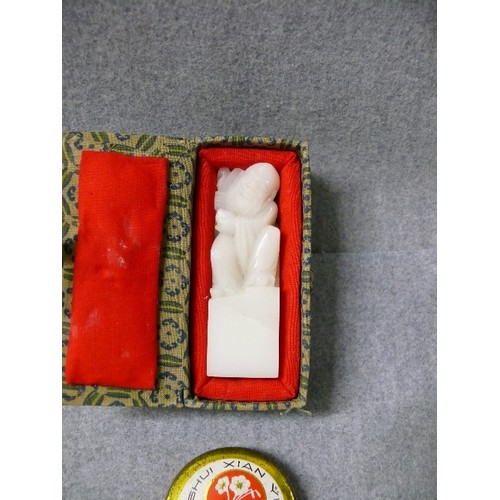 7A - A WHITE JADE CHINESE SEAL STONE UNCARVED  AND A TIN OF SEAL WAX