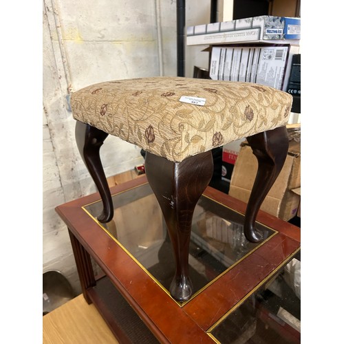 487 - GLASS TOPPED COFFEE TABLE AND A FOOT STOOL WITH CABRIOLE LEGS