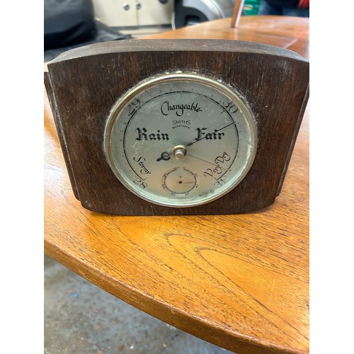 530 - 1950'S OAK CASED ANEROID BAROMETER AND THERMOMETER BY SMITHS