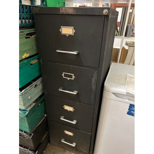 550 - A VINTAGE 1940'S BLACK 4 DRAWER FILING CABINET WITH CHROME HANDLES AND LABEL ATTACHED - 