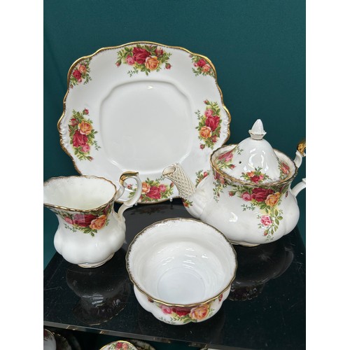 218 - A complete 12 serving Royal Albert Old Country Roses tea service comprising teapot, 2 x milk, 2 x su... 