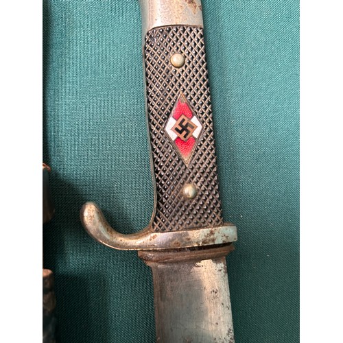 320 - An original German WW2 Hitler Youth Knife by E & F Horster, Solingen, enamel insignia, with metal an... 