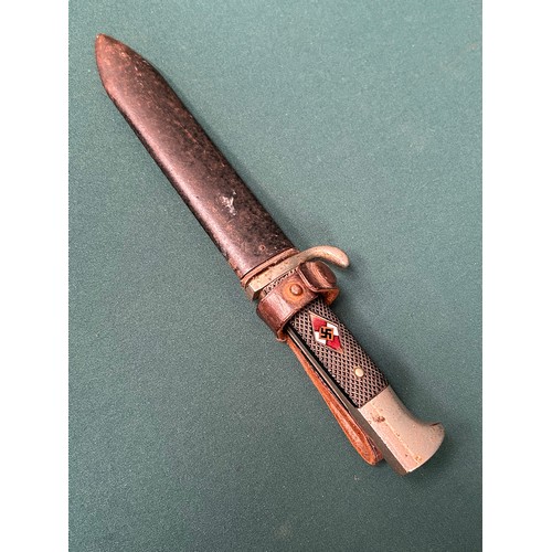 320 - An original German WW2 Hitler Youth Knife by E & F Horster, Solingen, enamel insignia, with metal an... 