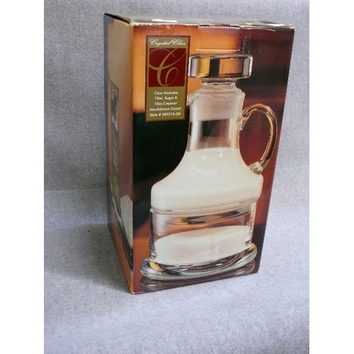 73 - A MOUTHBLOWN CRYSTAL CLEAR STACKABLE SUGAR AND CREAMER SET IN ORIGINAL BOX