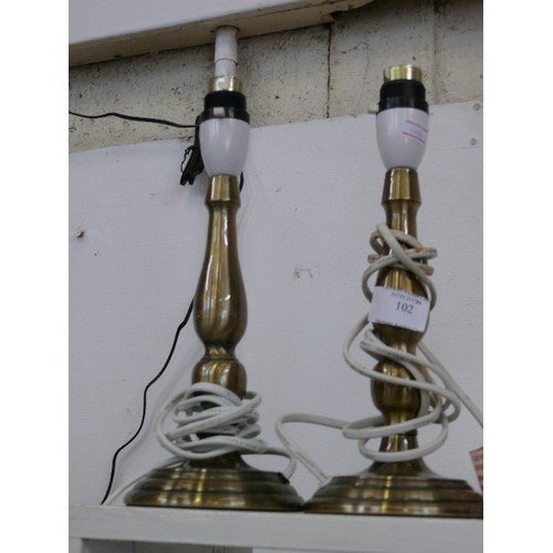 102 - A PAIR OF METAL TABLE LAMPS