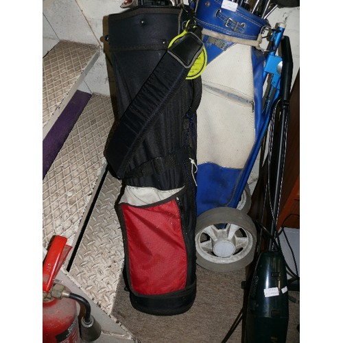 169B - A GOLD TROLLEY AND A GOLF BAG FULL OF CLUBS INCLUDING HOGAN, SPALDING, BUMBER ETC