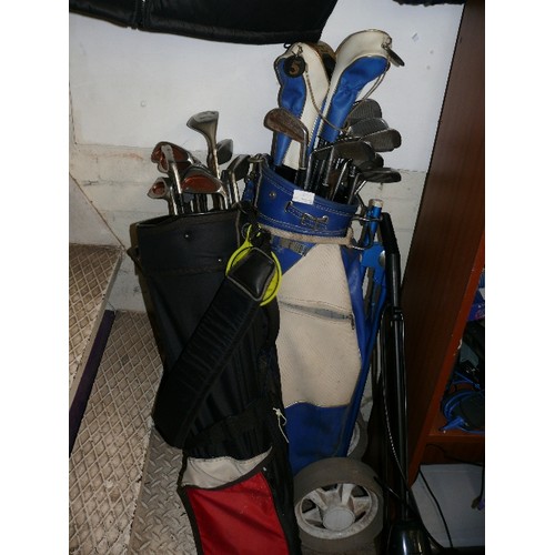 169B - A GOLD TROLLEY AND A GOLF BAG FULL OF CLUBS INCLUDING HOGAN, SPALDING, BUMBER ETC