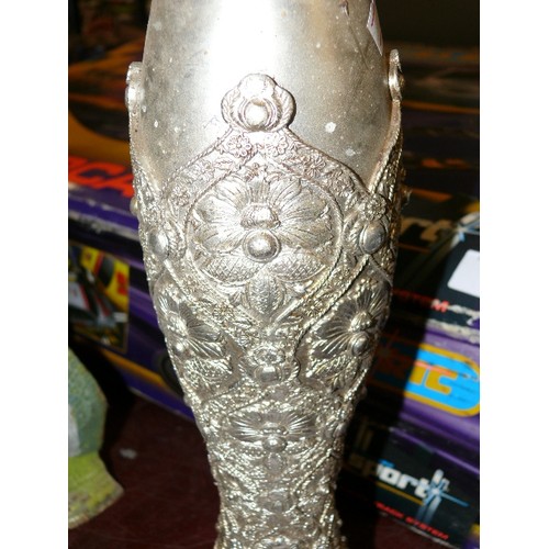 292 - A SILVER COLOURED CANDLEHOLDER