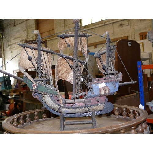 321 - A DECORATIVE WOODEN GALLEON SHIP MODEL