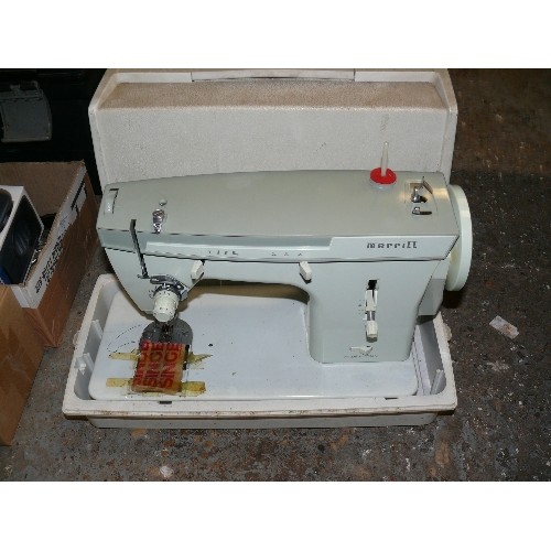 368 - A VINTAGE SEWING MACHINE BY MERRIT