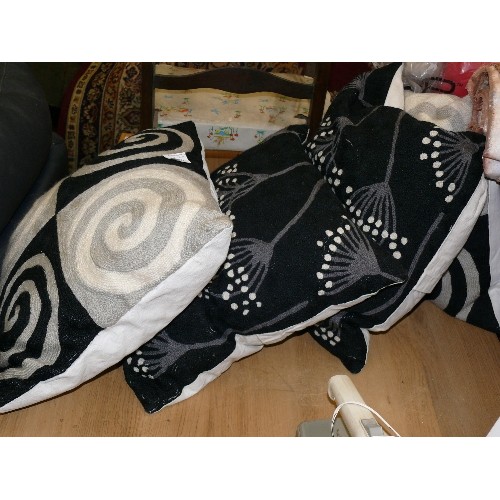 399 - A SET OF 4 GREAT MODEN  BLACK AND WHITE CUSHIONS