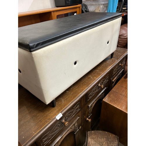 534 - MID CENTURY RETRO OTTOMAN BOX IN WHITE AND BLACK VINYL WITH TAPERED LEGS