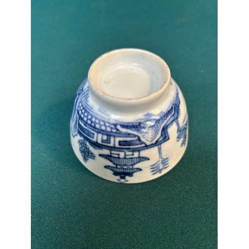 229 - A late 18th Century Chinese blue & white tea bowl decorated with a garden & lake scene, the interior... 