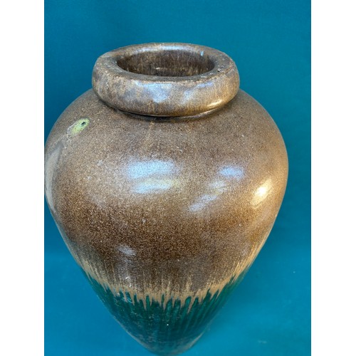 224 - A huge  earthenare floor vase in brown and green drip glaze, West German style - 72cm