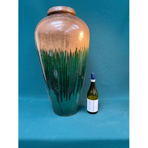 224 - A huge  earthenare floor vase in brown and green drip glaze, West German style - 72cm