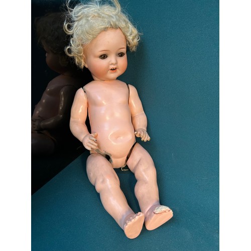 234 - An Edwardian Armand Marseille Koppelsdorf bisque headed doll with composition body - needs re jointi... 