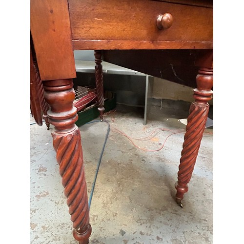 433 - A William IV mahogany Pembroke Table with spiral turned legs, on original brass castors, drawer to o... 