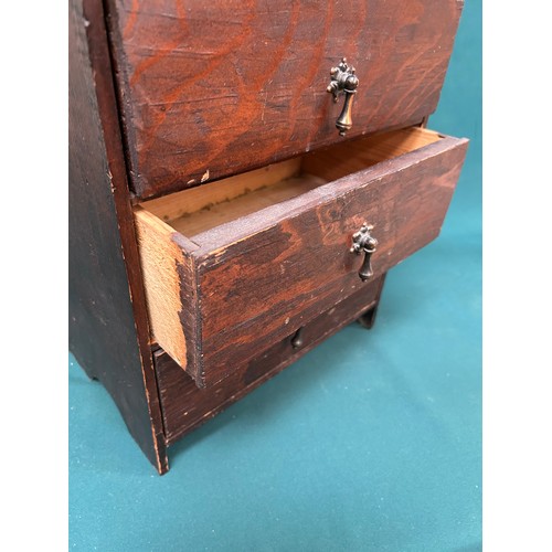 439 - An early 20th Century miniature stained pine chest of 3 drawers - 35cm x 22cm x 48cm