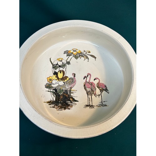 199 - 1920's Falcon Ware bowl with design of pink flamingo's and flowers - 42cm dia