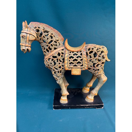 394 - Large Chunar or Tang Horse Sculpture by Austin Productions on a lacquered stand. The pierced hollow ... 