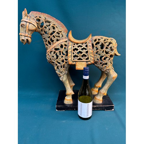 394 - Large Chunar or Tang Horse Sculpture by Austin Productions on a lacquered stand. The pierced hollow ... 