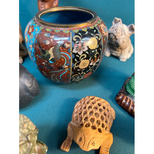 395 - An eclectic selection of mainly oriental items including a cloisonne vase with panels of birds and f... 