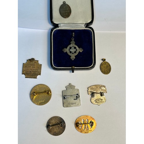 120 - Selection of medals and badges to include a  Sterling Silver 