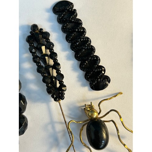 115 - Victorian and Edwardian mourning jewellery and accessories including an Irish bog oak 