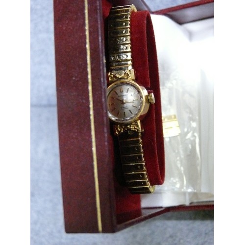 12 - A 18ct GOLD ROTARY WATCH WORKING WITH SPARE LINK IN BOX