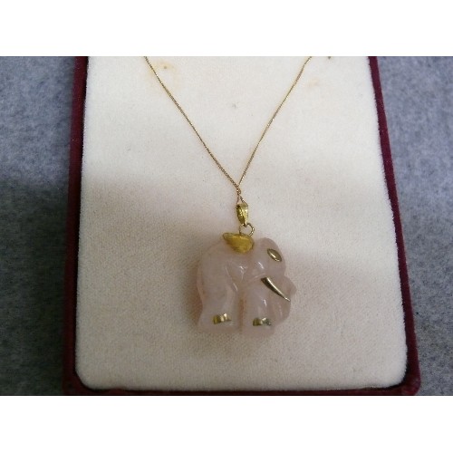 22 - A PINK CRYSTAL ELEPHANT ON A 9CT GOLD CHAIN .53gr