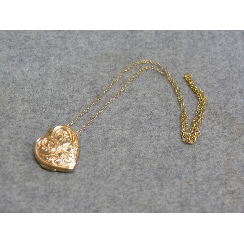 24 - A 9ct GOLD HEART SHAPE LOCKET ON A 9ct GOLD CHAIN WEIGHT 2.70gr