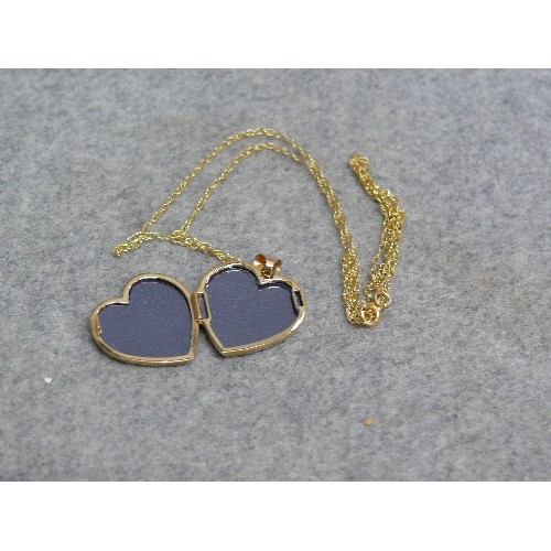 24 - A 9ct GOLD HEART SHAPE LOCKET ON A 9ct GOLD CHAIN WEIGHT 2.70gr