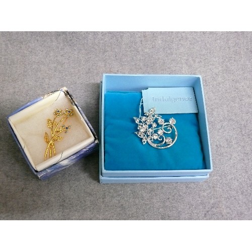 7 - 2 LOVELY BROOCHES IN BOXES. 1 BY INDULGENCE WHITE METAL WITH WHITE STONES