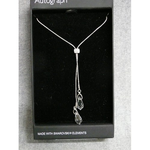 39 - AN AUTOGRAPH  NECKLACE WITH SWAROVSKI ELEMENTS,  BOXED