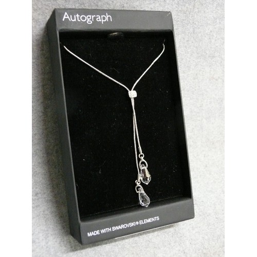 39 - AN AUTOGRAPH  NECKLACE WITH SWAROVSKI ELEMENTS,  BOXED