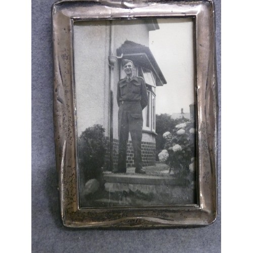 53 - A STERLING SILVER PHOTOGRAPH FRAME HALLMARKED BIRM 1923 BY S LESSER & SONS LTD