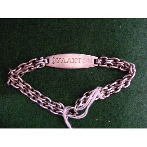 54B - A SOLID SILVER I.D. BRACELET ENGRAVED 