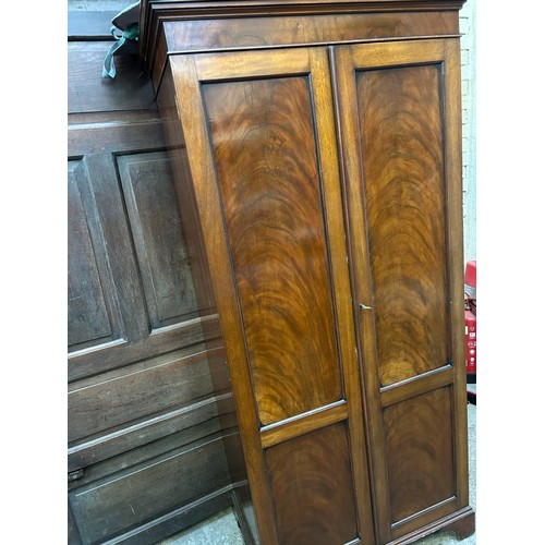 442 - A small mahogany wardrobe from the 1920's with panelled doors, hanging rail, original key - 82cm x 5... 