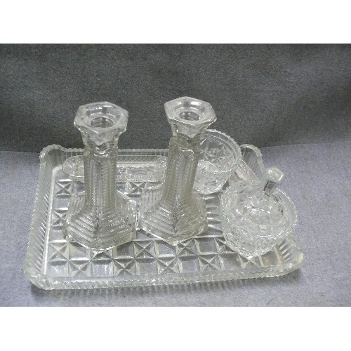 73 - CLEAR GLASS DRESSING TABLE SET, TRAY, CANDLESTICKS, DISH AND BOWL