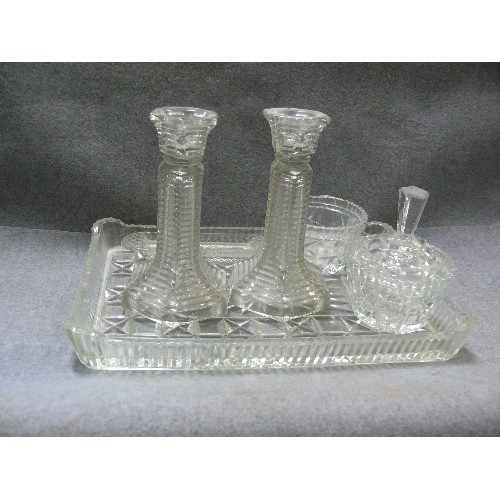 73 - CLEAR GLASS DRESSING TABLE SET, TRAY, CANDLESTICKS, DISH AND BOWL